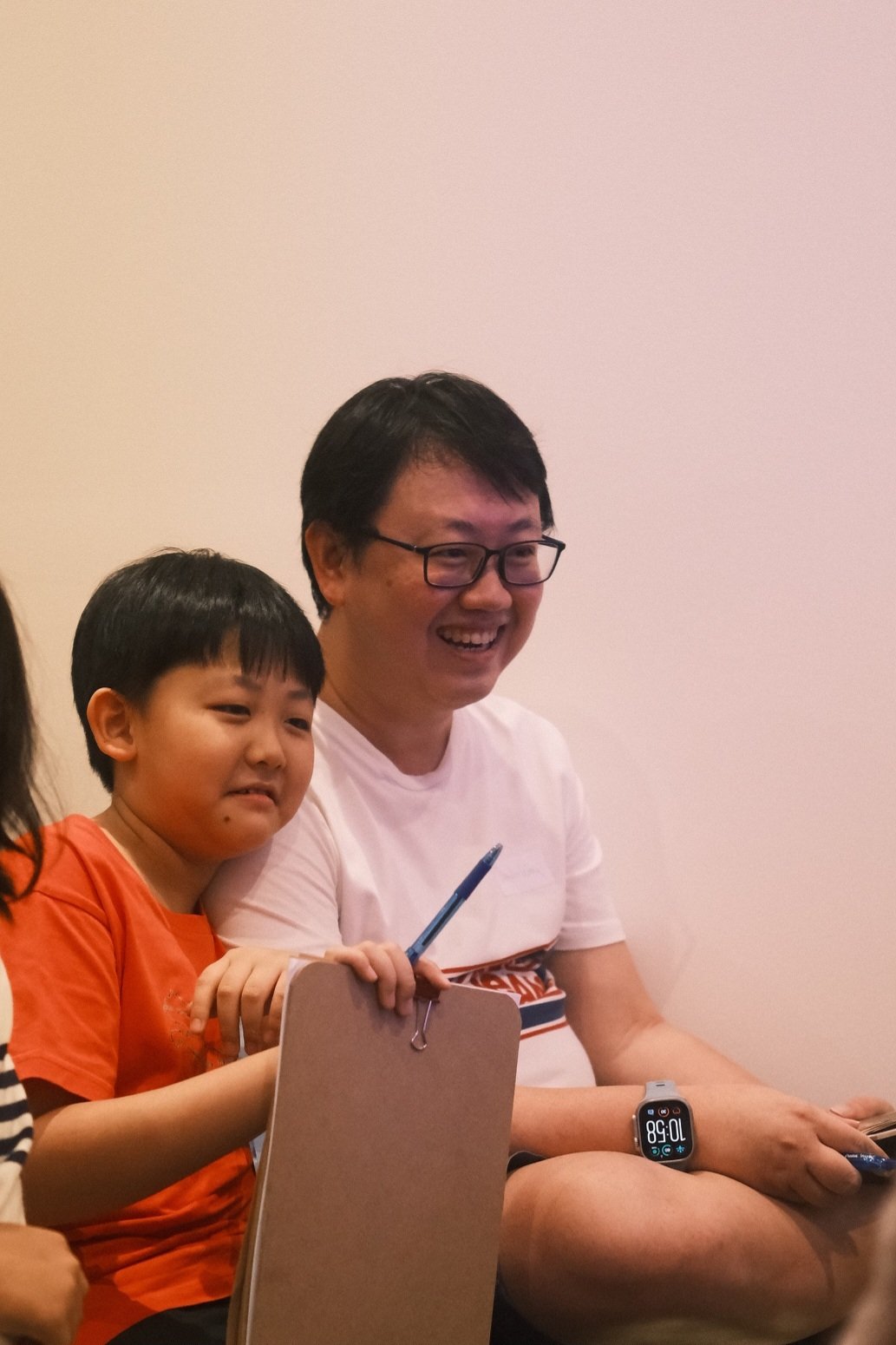Parent with child during the Escape Room event at The Learning Lab