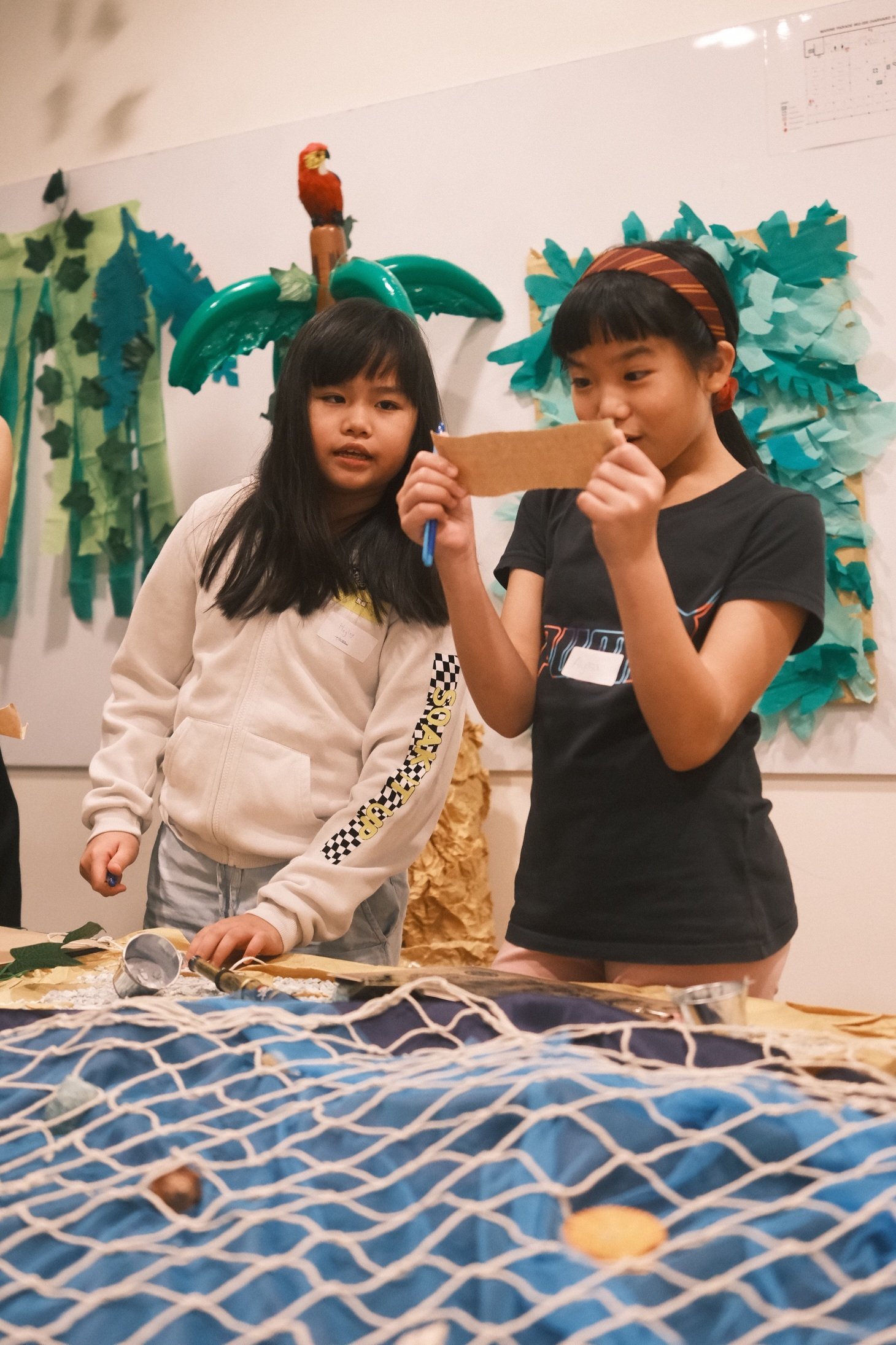 Students of The Learning Lab solve riddles together during Escape Room event